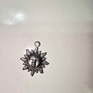 Sun Face Pendant in Silver Tone